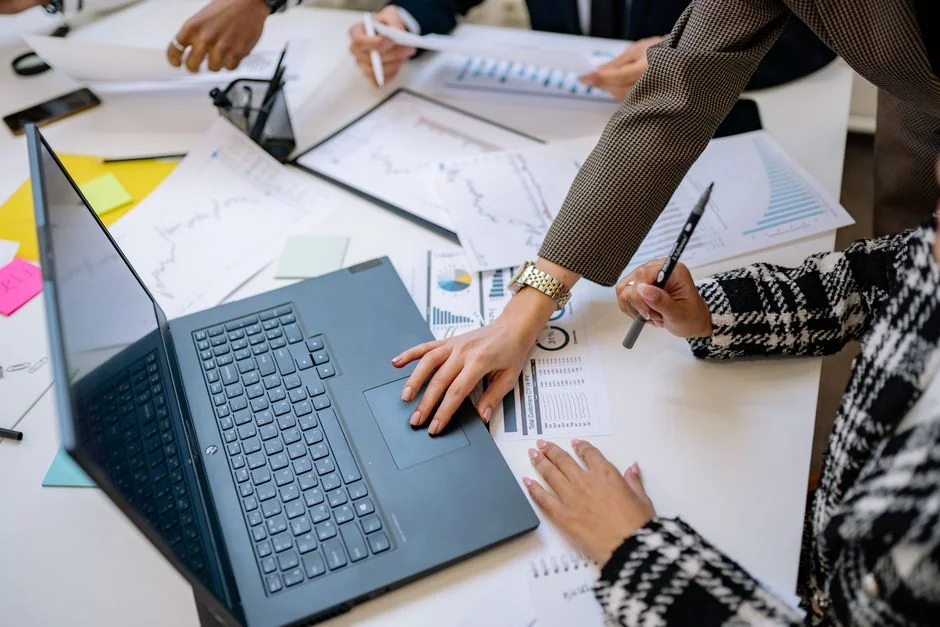 A stylish workspace featuring a laptop and monitor for social media marketing.